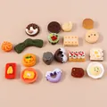 Assorted miniature resin food charms including cookies and cakes for DIY crafts - Mixed