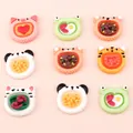 Detailed macro view of 9 miniature resin animal food charms for DIY phone case crafts - Mixed