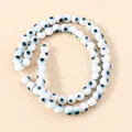 Mix of colorful resin evil eye beads for DIY necklace and bracelet jewelry making projects - White Green