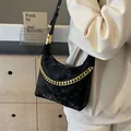 Black suede-textured shoulder bag with bold gold chain and adjustable leather strap - Small / Black