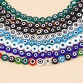 Macro shot of 10mm colorful resin evil eye beads for DIY jewelry making and crafting - 45 Pieces/Pack / Random Multicolor