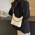 White crescent leather shoulder bag with bold gold chain strap and metal logo - Small / Off White