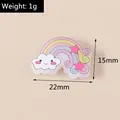 Detail showing dimensions of rainbow cloud resin accessory for DIY crafts and decor - Pink