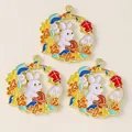 Detailed macro of Chinese enamel rabbit and lantern charms for DIY jewelry making - Osmanthus Rabbit Style