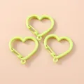 Tre moschettoni a forma di cuore in verde lime vibrante per la creazione di gioielli fai da te - Verde