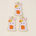 Detailed view of three enamel rabbit charms with colorful flowers and gold plating - Rabbit Cookie Style