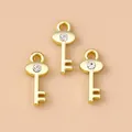 Drei goldene Zinklegierung Schlüsselanhänger mit Strass für DIY Schmuck und Ketten - Gold