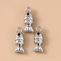 Drie verzilverde karperhangers met zwarte kristallen ogen voor DIY sieraden maken - Zilver