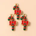 Christmas candy cane charms with red green stripes and bows for DIY jewelry making - Red and Green Striped Cane
