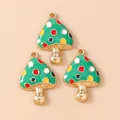 Tres colgantes de hongo verde con puntos de colores y acabado dorado para joyería DIY - Hongo Verde