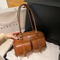 Maillard dark brown vintage Boston bag in polished PU leather with double front flap pockets - Brown