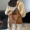 Brown leather tote with matte patchwork, teddy charm, and checkered scarf detail - Brown with Pendant