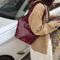 Large burgundy leather tote bag with geometric patchwork for women's winter street style - Burgundy