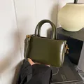 Borsa a mano vintage in pelle verde scuro con manici cilindrici e tracolla - Stile di base / Verde