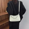 Elegant white quilted half-moon shoulder bag with silver chain and crossbody strap - Beige