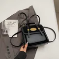 Elegant black contrast backpack with gold rivets and smooth synthetic leather finish - Without Pendant / Black