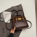 Retro dark brown leather backpack with contrast suede finish and metal buckle detailing - Without Pendant / Coffee