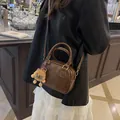 Dark brown leather Boston bag with plush lion charm and adjustable shoulder strap - 18*8*15 / Brown with Pendant