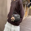 Black matte leather crossbody bag with lucky embossing and brown plush bear charm - 18*8*15 / Black With Pendant