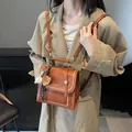 Brown vintage leather handbag with creative baseball pendant and metal clasp - Brown (Without Pendant)