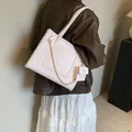 Creamy white lamb wool tote bag with matching pouch and golden chain decoration - White