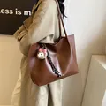 Minimalist dark brown tote bag with plush alpaca charm and long shoulder strap - Large / Brown with Pendant