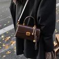Retro deep coffee leather shoulder bag with gold clasp and autumn leaf scenery - Coffee with Pendant