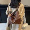 Brown hobo tote bag in mixed fabric textures with cute bear charm and scarf accessory - Coffee With Rabbit Pendant