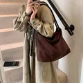 Minimalist large brown faux suede tote bag shown on model for daily commuting - Large Style / Brown