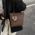 Brown woven leather tote bag with a leopard print heart charm for a retro aesthetic - Coffee with Pendant