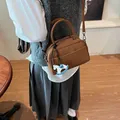 Brown leather barrel Boston bag with cute horse charm and adjustable shoulder strap - With Horse Charm (Yellow Brown)
