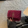 Deep wine red velvet crossbody bag with V-shaped quilting and gold tassel charm - Red