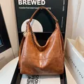 Retro brown oil wax leather hobo bag with braided knot tassel for women daily commute - Brown with Pendant