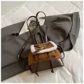 Detail of mini bucket bag with faux fur trim and brown leather material contrast - Brown No Pendant