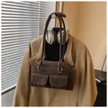 Detailed view of vintage dark brown faux suede boston bag with functional front pockets - Brown No Pendant
