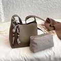 Khaki pebbled leather bucket bag with silk scarf handle and matching pouch set - With Pendant / Elephant Grey