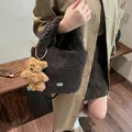 Fuzzy dark brown faux shearling bucket bag with a cute plush teddy bear charm - With Charm / Brown