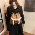 Vintage plush patchwork backpack for women with a golden butterfly charm and soft fur trim - 32cmx10cmx29cm / Khaki