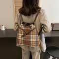 Brown and blue checkered wool backpack with leather straps and metal lock buckle - Navy Plaid
