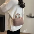 Plush crossbody handbag in light coffee faux fur with matching leather straps - Coffee
