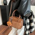 Vintage brown leather crossbody bag with teddy bear charm and dual zipper for autumn - 26*9*17cm / Brown