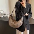 Brown leather crescent hobo bag with topstitch details and baseball charm accessory - Elephant Gray with Charm