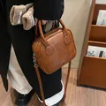 Brown quilted faux leather pillow bag with top handles and adjustable shoulder strap - 21*8*18 / Brown