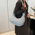 Soft light blue quilted puffer shoulder bag for women with wide strap and cloud shape - Gray