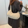 Beige padded half-moon shoulder bag in soft quilted nylon for a minimalist modern look - Khaki