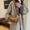 Vintage brown Boston bag with stylish leopard print wide strap and metal logo plaque - Khaki