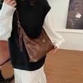 Chic dark brown faux leather shoulder bag with colorful braided tassel ornament - Brown