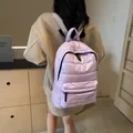 Light purple quilted puffer backpack with horizontal stitching for casual daily use - 30*13*40 / Purple