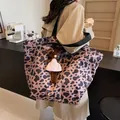 Fashionable leopard print tote bag with plush bear charm shown in a large capacity design - No Pendant / Coffee