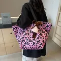Pink cow print tote bag with black strap and cute plush mouse charm hanging on it - No Pendant / Pink
